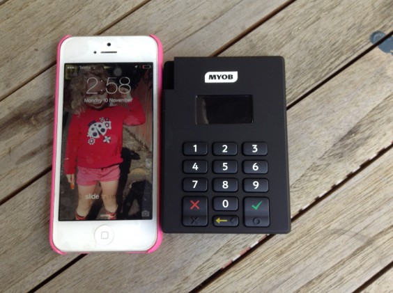 My iPhone next to the MYOB PayDirect Reader